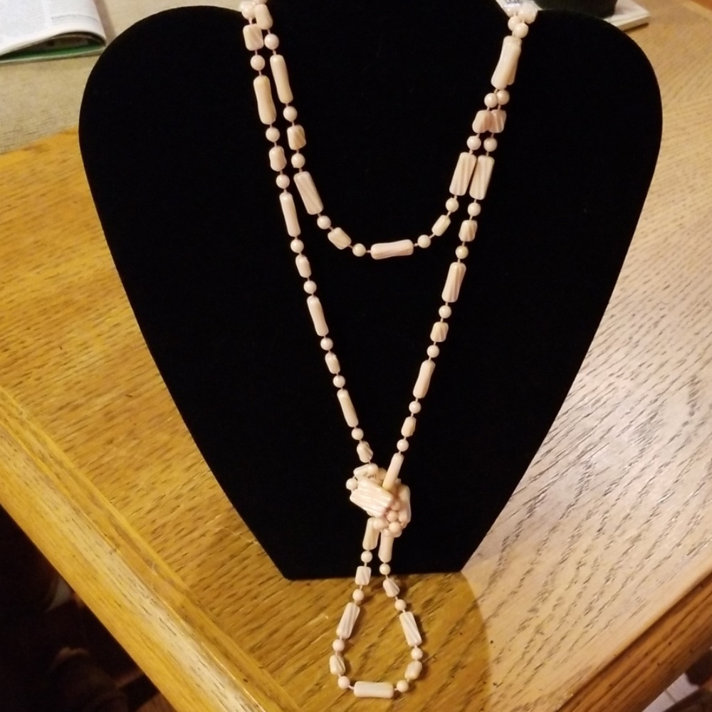 Long pale pink necklace